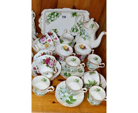 A SIX PIECE PARAGON 'TRILLIUM' TEA SET, to include cups, saucers and teapot, etc, together with Royal Albert cups and saucers