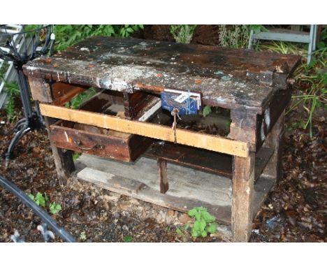 A VINTAGE WOODEN WORK BENCH, with two vices, approximate length 122cm