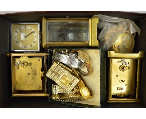 A BOX OF VARIOUS CARRIAGE CLOCK PARTS, and spares for wristwatches
