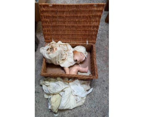 WICKER BASKET WITH VINTAGE CHINA DOLL IN PIECES