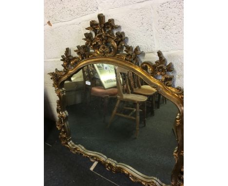 LARGE HEAVILY GILT FRAMED OVER MANTLE MIRROR WITH FLOWER &amp; LEAF DECORATION