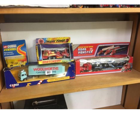 SHELF OF 2 BOXED LORRIES, FIRE ENGINE &amp; RACE CAR