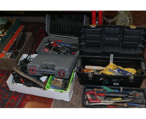 A lot of tools including tool box and contents of hand tools, power sander, hatchets, hammer drills.