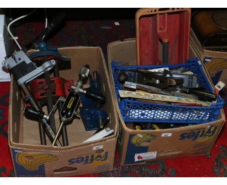 Two boxes of various tools including bench clamps, chisels, plyers, Stanley made hand drill etc.