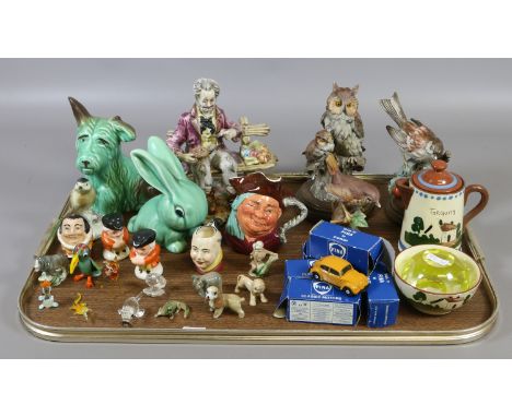 A tray of collectables including Sylvac models of a bunny and dog, Capodimonte, Torquay wares, Wade whimsies, boxed Fina Diec