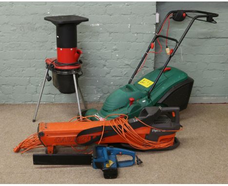 A quantity of gardening tools including rotary blade branch, leaf shredder, Flymo vac, Bosch electric lawnmower and Black and