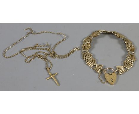 A 9ct gold gate bracelet and a 9ct gold crucifix and chain, 22.25 grams.