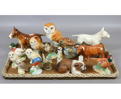 A good tray of ceramic models of animals including a Border Fine arts highland bull, Beswick owls, duck, kingfisher, meerkat,