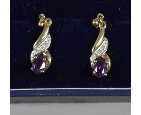A pair of 9ct gold amethyst and diamond drop earrings and a pair of 9ct gold opal stud earring.
