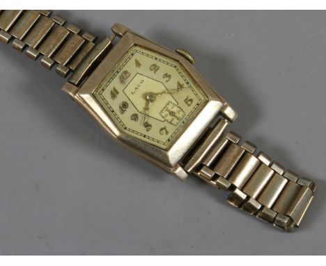 A ladies 9ct gold Laco manual Art Deco watch on gold plated bracelet strap with applied Arabic numeral markers and subsidiary