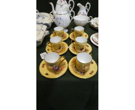 A Set of Six Aynsley Orchard Gold Coffee Cans and Saucers 
