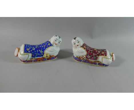 A Pair of Chinese Ceramic Pillows in the Form of Reclining Children, 7.5cm High 