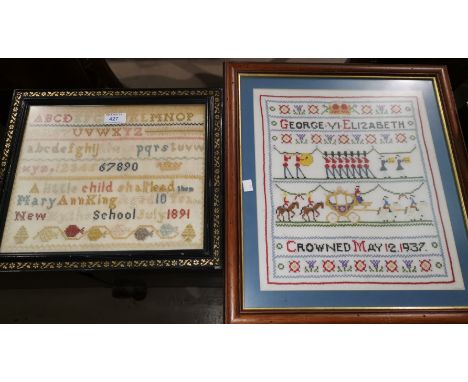 An alphabetical sampler by Mary Ann King, 1891; a George V  Coronation sampler, framed and glazed 