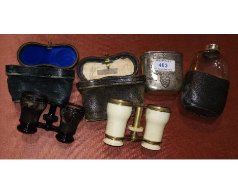 Two pairs of opera glasses, cased; a hip flask with chased silver plated cup 