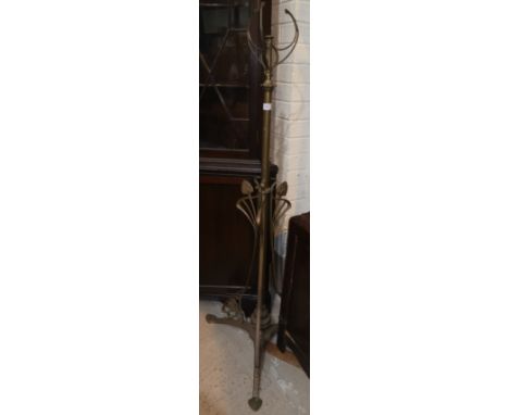 An Art Nouveau brass telescopic oil lamp column; a companion set; etc. 