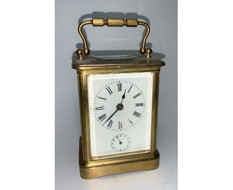 A brass carriage clock with timepiece movement and alarm 