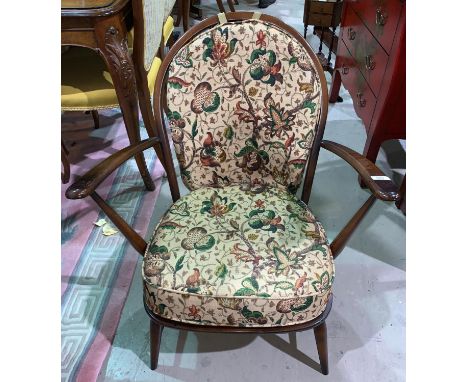 An Ercol stick back armchair 