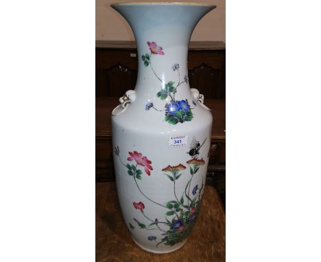 A large mid 19th century Chinese famille rose rouleau shape vase decorated with exotic flowers and insect, multi character te