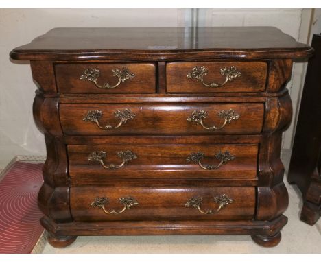 A reproduction French miniature commode of 3 long and 2 short drawers by Theodor Alexander 