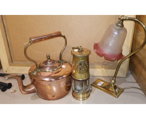 A solid brass desk lamp by Christopher Ray; a 19th century copper kettle; a brass miners' lamp 