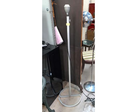 A mid century German designer standard lamp in brushed metal