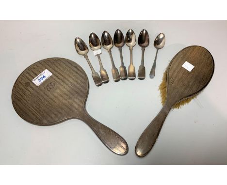A Georgian set of 5 silver teaspoons, and an odd teaspoon, London 1819, 4 oz; a 1930's hand mirror and brush with silver engi