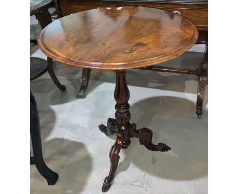 A Victorian tripod table with circular figured walnut top, 57" 