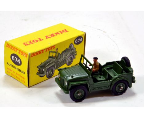 Dinky No. 674 Austin Champ in military green. Nice example is E to NM in E Box.