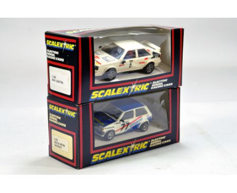 Vintage Scalextric Duo comprising C.348 Audi Quattro plus C.303 Austin Metro. Untested but display well in original boxes. (2