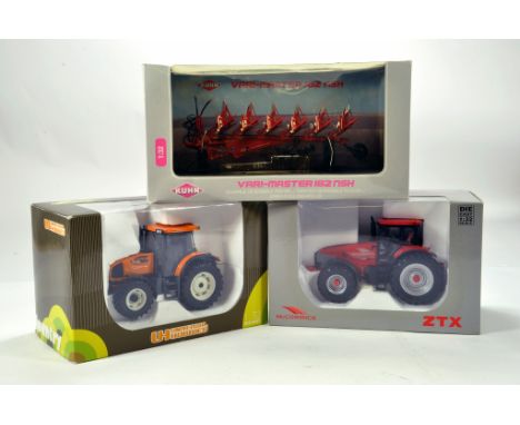 Universal Hobbies 1/32 Farm Issue comprising McCormick and Renault Tractor models plus Kuhn Plough. E to NM in Boxes. (3)
