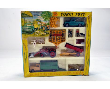 Corgi No. GS5 Agricultural Gift Set comprising Massey Ferguson 165 Tractor with Shovel, Tandem Disc Harrow, Farm Tipping Trai