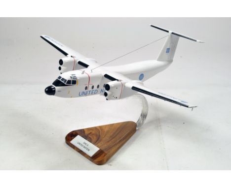 Large Scale Model of a DHC-5 United Nations Aircraft. Complete with unapplied components and outer box. 