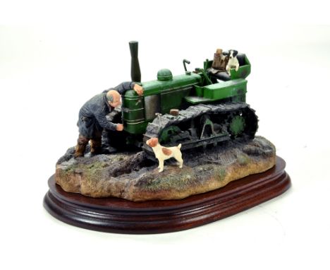  A static presentation piece comprising Starts First Time, A Border Fine Arts model featuring a Field Marshall Tractor. Fine 