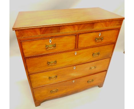 A 19thC mahogany chest, the overhanging top raised above a diamond inlay and two short and three long cockbeaded drawers, on 