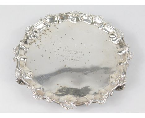 A Victorian silver waiter, of piecrust outline broken by shells, engraved to the centre Henry Taylor from Arga Alexander 1885