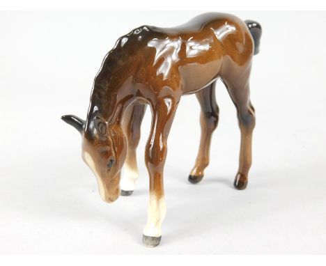 A Beswick ceramic model of a brown foal