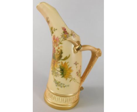 A Royal Worcester porcelain jug, painted with flowers on a blush ivory ground, the handle cast as an antler, printed mark in 