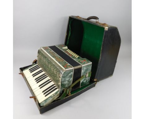 A mid 20thC Modello Art Deco style piano accordion, with an arrangement of 8x3 buttons in a highly elaborate case with out a 