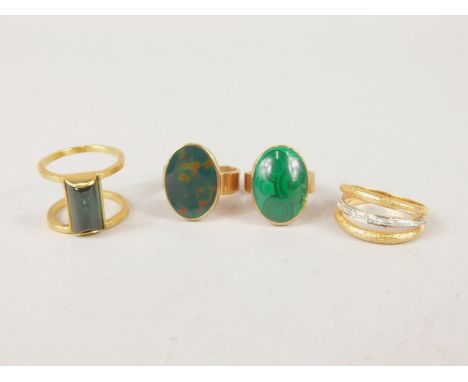 Various dress rings, to include a malachite style oval signet ring, double set ring with shaped centre section etc. (4)