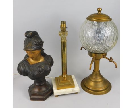 Three decorative items, a cast metal and painted bust of Minerva, a column table lamp and an iced drinks dispenser with four 