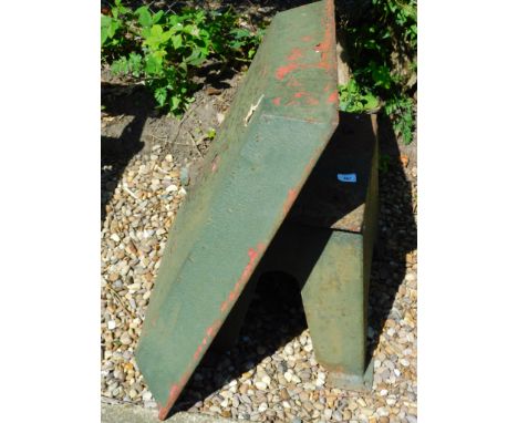 A rectangular iron animal trough, on a tapering stand