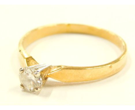 A diamond solitaire ring, the stone of 4.1mm dia in yellow metal stamped 750, 1.6g all in