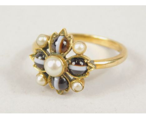 A 19thC memorial ring, with flowerhead set with five pearls, unmarked, 2.8g all in