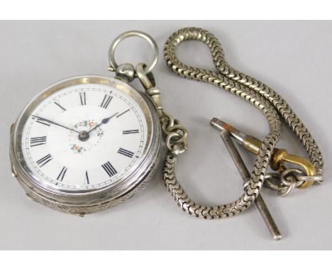 A silver pocket watch, with white enamel dial, and floral centre, marked Scottish Nights Prize. 