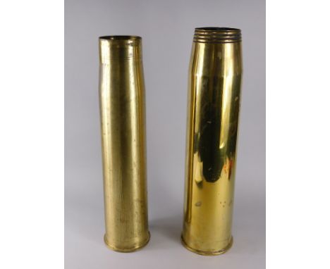 Two large brass shell cased stick stands, 65cm high etc. (a quantity)