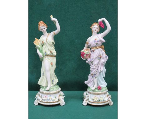 PAIR OF DRESDEN HANDPAINTED AND GILDED RELIEF DECORATED CERAMIC FIGURINES APPROXIMATELY 39cm HIGH 