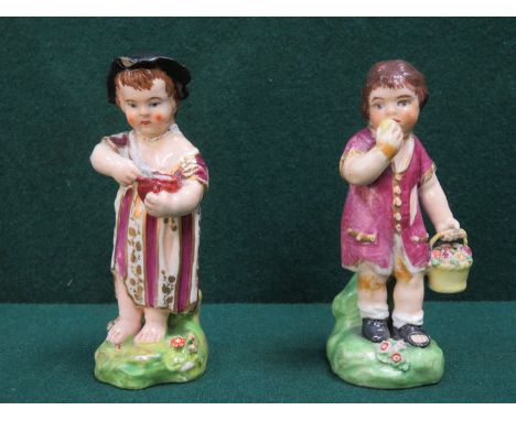 TWO SIMILAR HANDPAINTED 19th CENTURY CERAMIC FIGURES (AT FAULT), APPROXIMATELY 12cm HIGH 