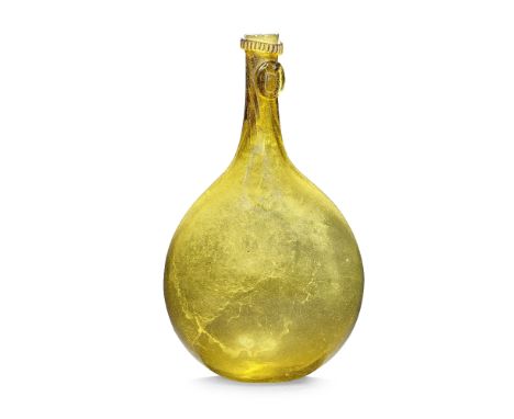 A very rare Belgian armorial sealed mineral water flask, circa 1724-43 Of light amber tint, the flattened ovoid body with a l