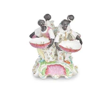 A Derby figural centrepiece or sweetmeat stand, circa 1770-75Modelled as four black figures surrounding a central column, eac