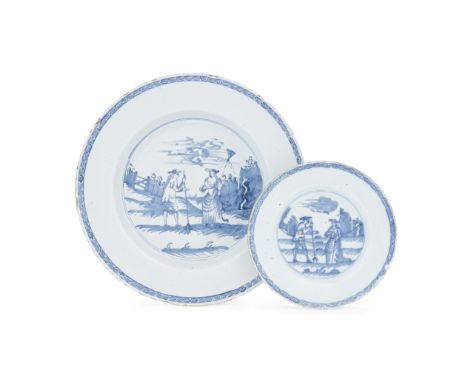 Two unusual English delftware plates, circa 1750Painted in blue with a pair of harvesters in conversation, both holding farmi
